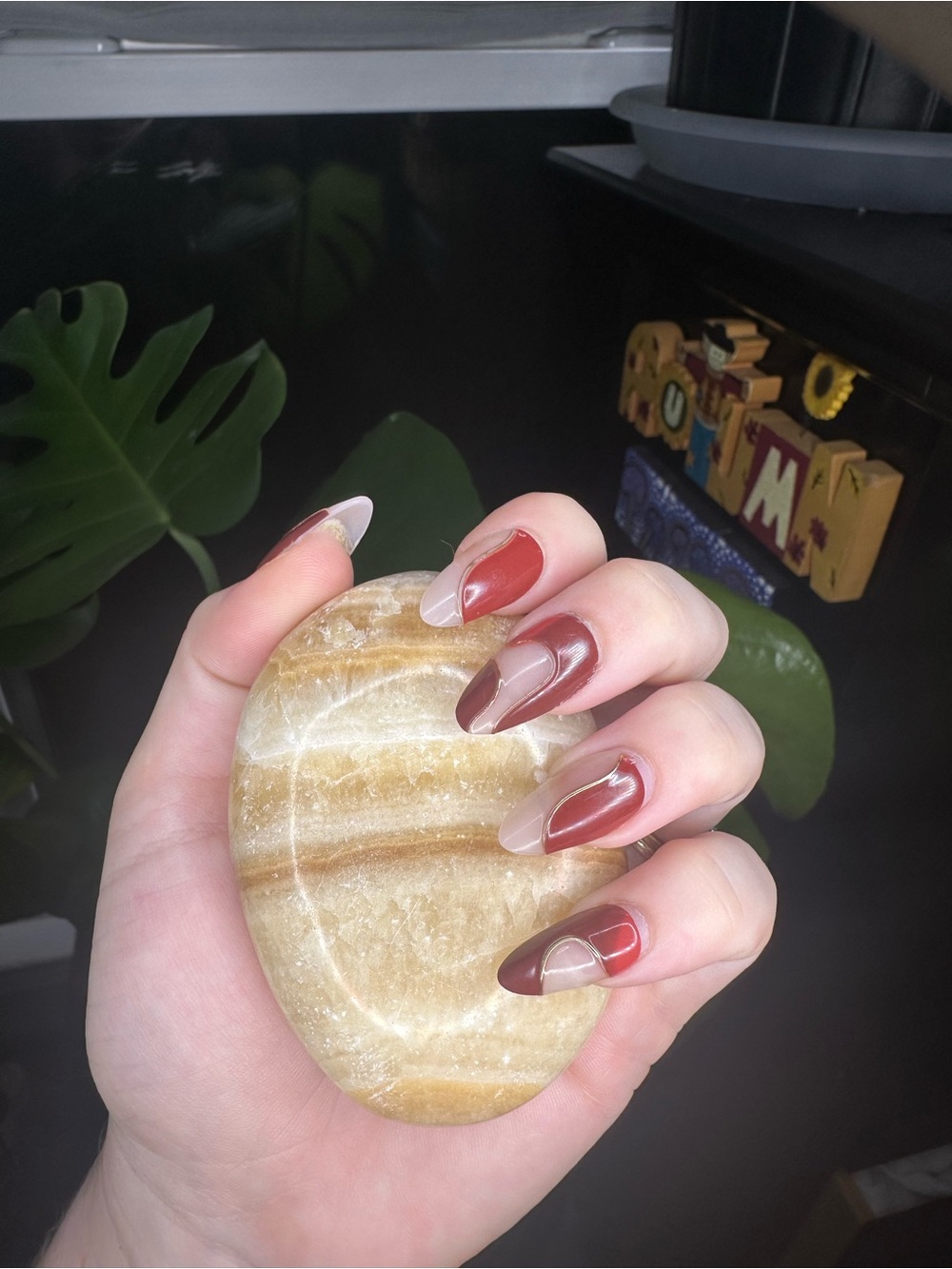 Yellow and tan banded calcite crystal palmstone